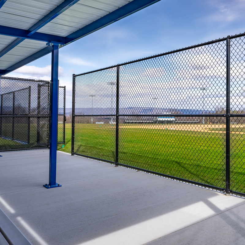 chain link fence to a baseball field