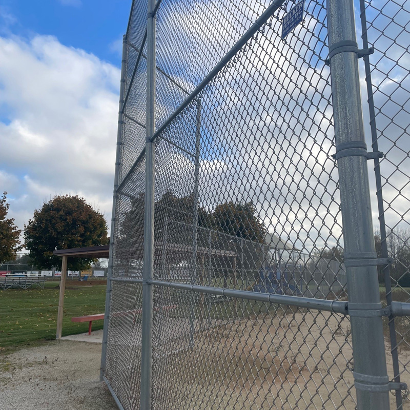 chain link fence installation at baseball field